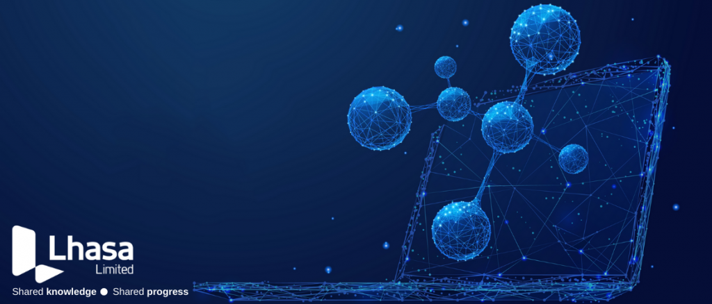 Laptop and molecules in blue